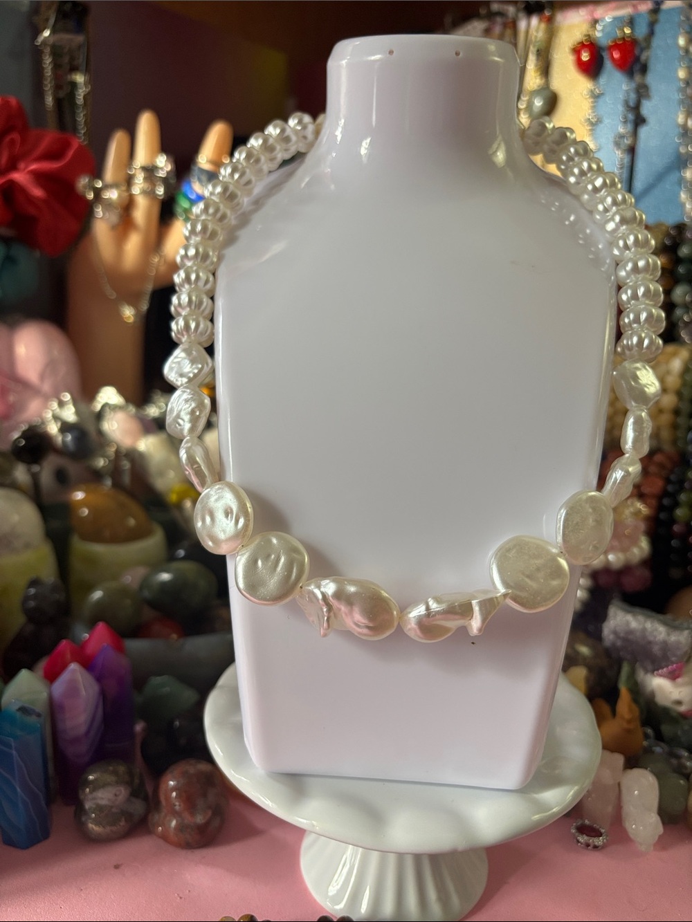 Lustrous baroque necklace features irregularly shaped natural white pearls.